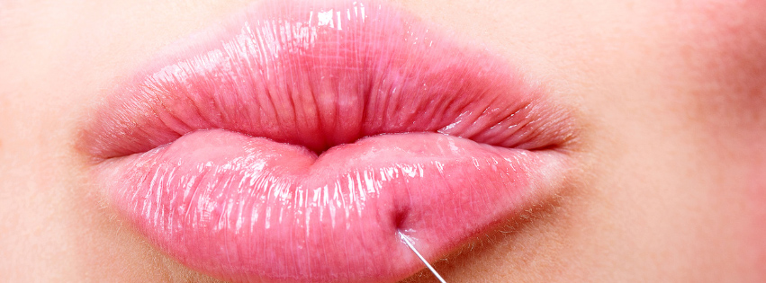 woman brushing her teeth